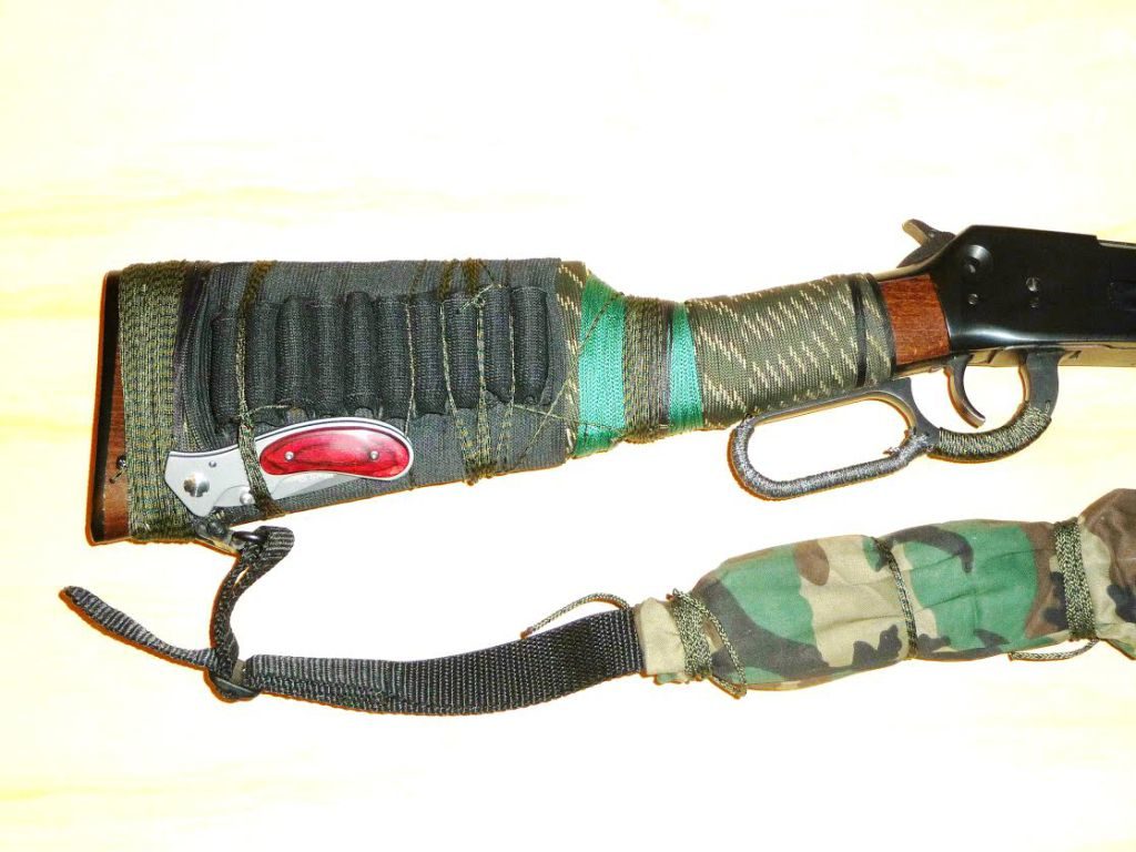 lock bladed knife attached to rifle stock